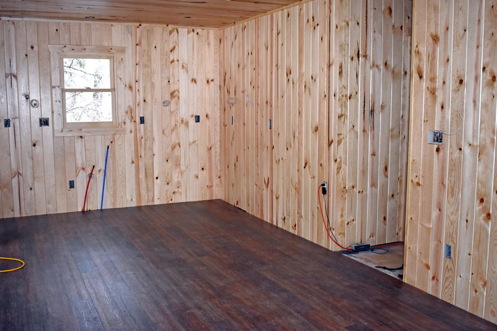 The flooring is installed in the living room of Cabin 14